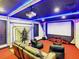 Custom Star Wars themed theater room with projector, comfortable seating and themed wall decor at 1491 Rolling Fairway Dr, Davenport, FL 33896