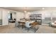Bright office with a shared work space and modern decor including decorative teepee and shelving at 15148 Willow Ridge Dr, Montverde, FL 34756