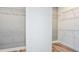 Spacious walk-in closet with wood floor and built-in shelving for optimal storage and organization at 15148 Willow Ridge Dr, Montverde, FL 34756