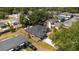 An aerial view showing a large yard, patio, fence line and the surrounding neighborhood at 18 Cooledge St, Winter Garden, FL 34787