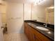 Bathroom with vanity and granite countertop at 2586 Robert Trent Jones Dr # 1116, Orlando, FL 32835