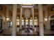 Bright and welcoming lobby with high ceilings, large windows, and stylish decor at 2586 Robert Trent Jones Dr # 1116, Orlando, FL 32835