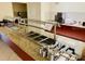 Well-equipped buffet area featuring stainless steel serving stations and ample space for food preparation and service at 2611 Shantiniketan Blvd # G-11, Tavares, FL 32778