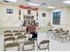 This beautiful space is a house of worship with many chairs at 2611 Shantiniketan Blvd # G-11, Tavares, FL 32778