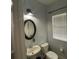 Bathroom features a vessel sink, a toilet, and a window at 2667 River Landing Dr, Sanford, FL 32771