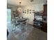 Dining area features stylish lighting, modern decor, and a comfortable seating area at 2667 River Landing Dr, Sanford, FL 32771