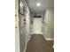 Bright hallway with tiled floors and decorated walls leads to the main entrance at 2667 River Landing Dr, Sanford, FL 32771
