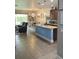 Well-equipped kitchen with an island, pendant lights, and stainless appliances at 2667 River Landing Dr, Sanford, FL 32771
