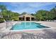 Community pool area providing a refreshing oasis with lounge chairs and covered pavilion at 2667 River Landing Dr, Sanford, FL 32771