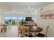 Bright dining room with water views and a chandelier at 2700 N Peninsula Ave # 314, New Smyrna Beach, FL 32169