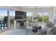 Cozy living room with large windows and beautiful view of the water at 2700 N Peninsula Ave # 314, New Smyrna Beach, FL 32169