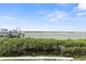 Enjoy expansive waterfront views from this property featuring a boat dock, and lush mangroves at 2700 N Peninsula Ave # 314, New Smyrna Beach, FL 32169