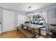 Cozy dining area with bench seating and a charming pendant light fixture at 2707 Prince John Rd, Winter Park, FL 32792