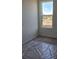 Bright bedroom featuring one large window providing ample natural light and neutral carpet at 2976 Embark Trail, St Cloud, FL 34771