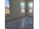 This bedroom is bright and spacious with three large windows providing ample natural light at 2976 Embark Trail, St Cloud, FL 34771