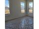 This bedroom is bright and spacious with three large windows providing ample natural light at 2976 Embark Trail, St Cloud, FL 34771