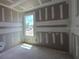 Unfinished bedroom with window providing natural light at 2976 Embark Trail, St Cloud, FL 34771