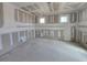 Spacious bedroom showcasing drywall, recessed lighting, and natural light from two windows at 2976 Embark Trail, St Cloud, FL 34771