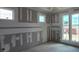 Bright, unfinished bedroom featuring drywall and natural light from three windows at 2976 Embark Trail, St Cloud, FL 34771