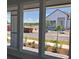 Neighborhood and new home construction featuring lush, green landscaping at 2976 Embark Trail, St Cloud, FL 34771