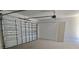 Spacious one car garage with white walls and ceiling at 2976 Embark Trail, St Cloud, FL 34771
