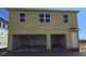 Two car garage with unfinished drywall at 2976 Embark Trail, St Cloud, FL 34771