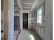 Hallway with a window and unfinished drywall at 2976 Embark Trail, St Cloud, FL 34771