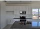 Modern kitchen featuring stainless steel appliances, granite countertops and ample cabinet space at 2976 Embark Trail, St Cloud, FL 34771