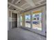 Living room with multiple windows and unfinished walls and floors at 2976 Embark Trail, St Cloud, FL 34771