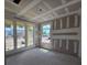 Bright living room features multiple windows and unfinished walls and floors at 2976 Embark Trail, St Cloud, FL 34771