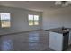Bright, open-concept living area with natural light and kitchen island at 2976 Embark Trail, St Cloud, FL 34771