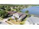 Lakeside home with a private backyard, lush lawns, and well-maintained landscaping in a great community at 318 Osprey Lakes Cir, Chuluota, FL 32766