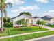 Charming single-story home with a well-manicured lawn and curb appeal at 3514 Forest Ridge Ln, Kissimmee, FL 34741