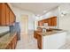 Gourmet kitchen with granite countertops, stainless steel appliances, and custom cabinetry at 3514 Forest Ridge Ln, Kissimmee, FL 34741