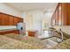 Gourmet kitchen with granite countertops, stainless steel appliances, and custom cabinetry at 3514 Forest Ridge Ln, Kissimmee, FL 34741