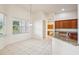 Bright kitchen and breakfast nook with granite countertops and ample cabinet space at 3514 Forest Ridge Ln, Kissimmee, FL 34741