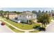 Corner lot featuring a well-maintained home with a large yard and privacy fence at 3556 Cheswick Dr, Ocoee, FL 34761