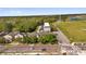 Aerial view of community with trees and road at 3912 Avalon Park West Blvd, Orlando, FL 32828