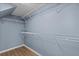 Walk-in closet with wire shelving, offering ample storage space for clothes and accessories at 3912 Avalon Park West Blvd, Orlando, FL 32828