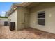 The brick patio area has a door and window along with exterior electrical outlets at 3912 Avalon Park West Blvd, Orlando, FL 32828