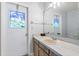 Bathroom featuring large mirror and vanity area at 400 Woodview Dr, Longwood, FL 32779