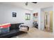 Bedroom featuring window, closet, and neutral-toned walls at 400 Woodview Dr, Longwood, FL 32779