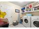 Laundry Room with side-by-side washer and dryer at 400 Woodview Dr, Longwood, FL 32779