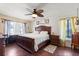 Main bedroom features hard wood floors and bright windows at 400 Woodview Dr, Longwood, FL 32779