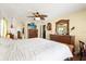 Main bedroom featuring ceiling fan and natural light at 400 Woodview Dr, Longwood, FL 32779