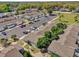 Aerial view of the community featuring multiple units and a parking area at 402 Dorchester Sq, Lake Mary, FL 32746
