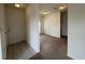Inviting entryway featuring tile flooring transitioning to carpet at 402 Dorchester Sq, Lake Mary, FL 32746