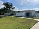 Single-story home with a well-manicured front lawn and white privacy fence at 402 Dorchester Sq, Lake Mary, FL 32746