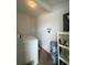 Functional laundry room with washer, dryer, and storage shelves at 402 Dorchester Sq, Lake Mary, FL 32746