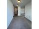 Spacious living area with neutral carpet and ample natural light at 402 Dorchester Sq, Lake Mary, FL 32746